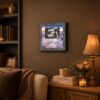 God Is Watching Over You framed wall art displayed in a living room