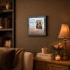Footprints in the Sand framed wall art displayed in a coastal-style bedroom