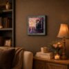 Life Isn't About Waiting for the Storm to Pass framed wall art displayed on a desk
