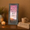 Memorial framed wall art displayed on a mantel shelf
