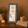 Toilet paper patent print framed wall art displayed in a guest bathroom
