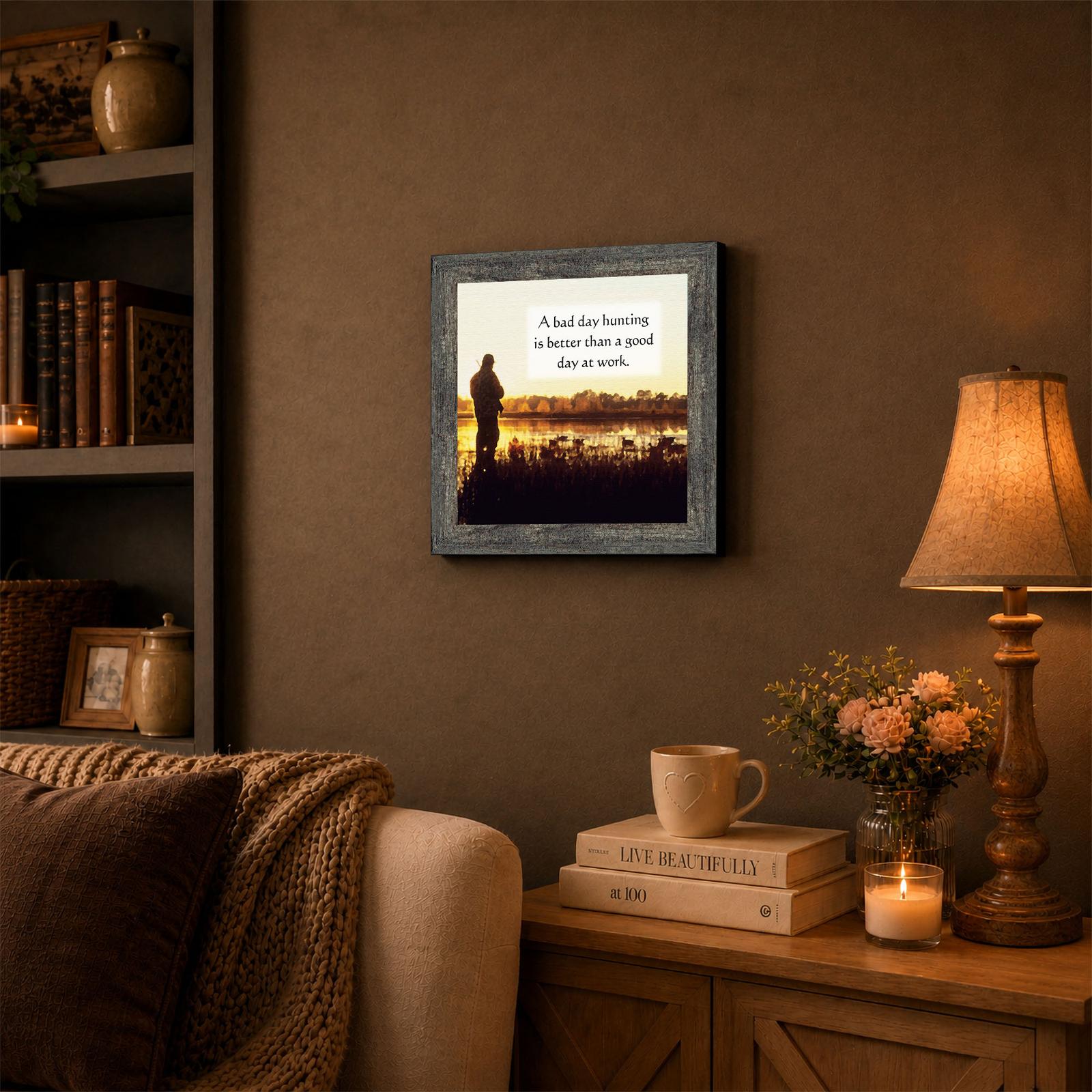 Bad Day Hunting framed wall art displayed in a cabin den