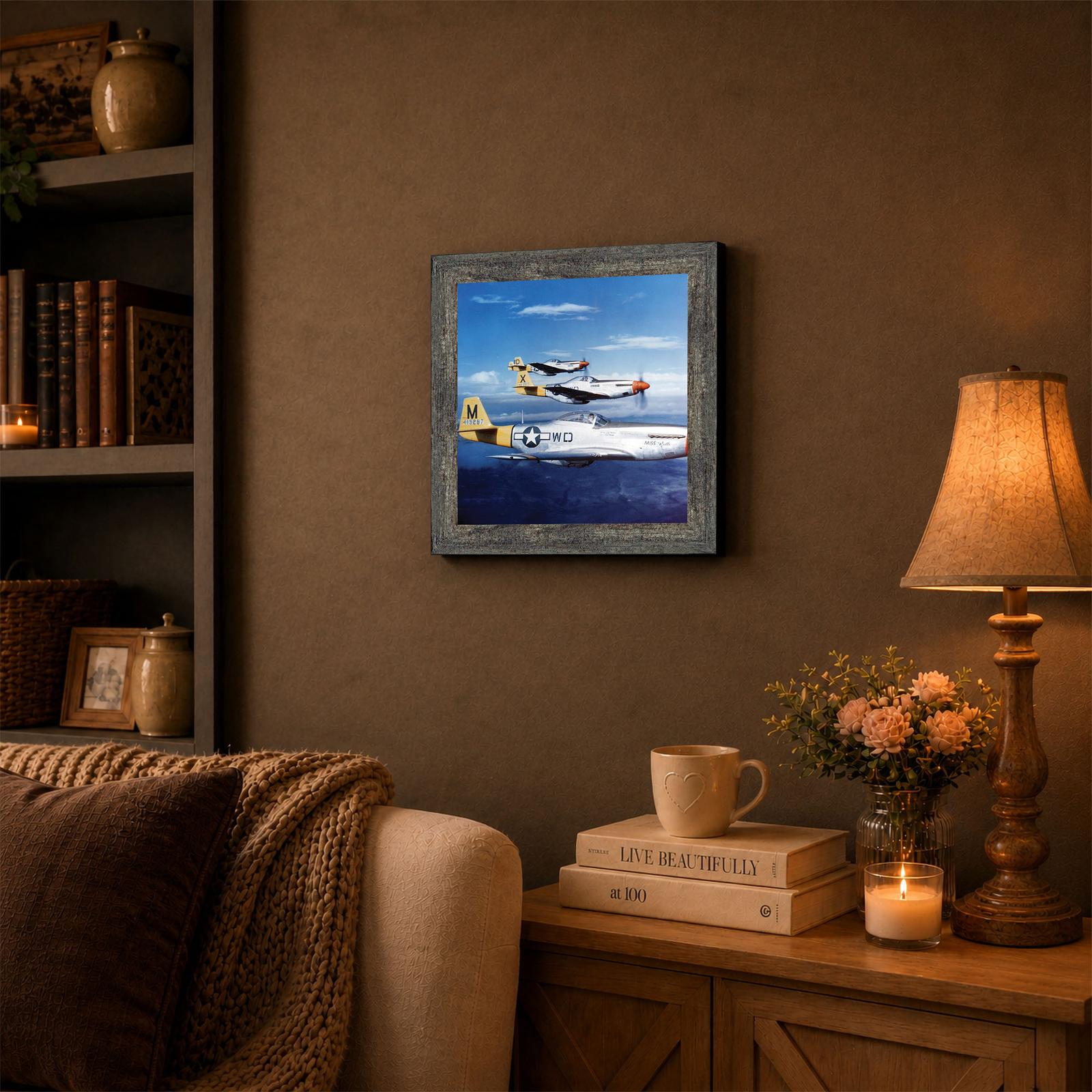 WWII fighter plane framed wall art displayed in a home office