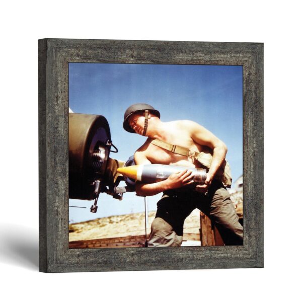 WWII artillery framed print - soldier loading a field gun by Crossroads Home Decor