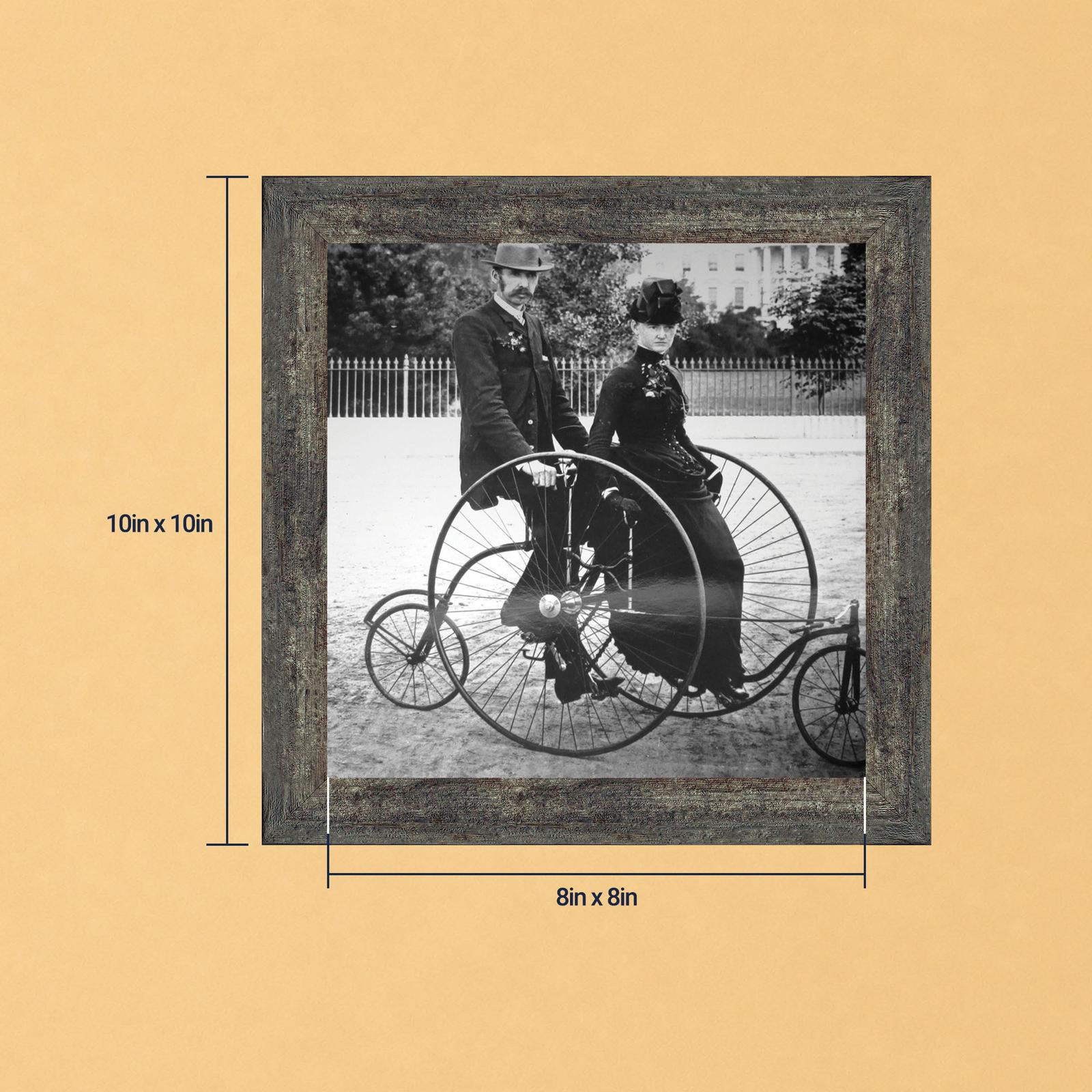 Vintage tricycle photo framed print - 1880s couple on a two-seat tricycle by Crossroads Home Decor