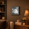 Vintage children playing framed wall art displayed in a den or living room