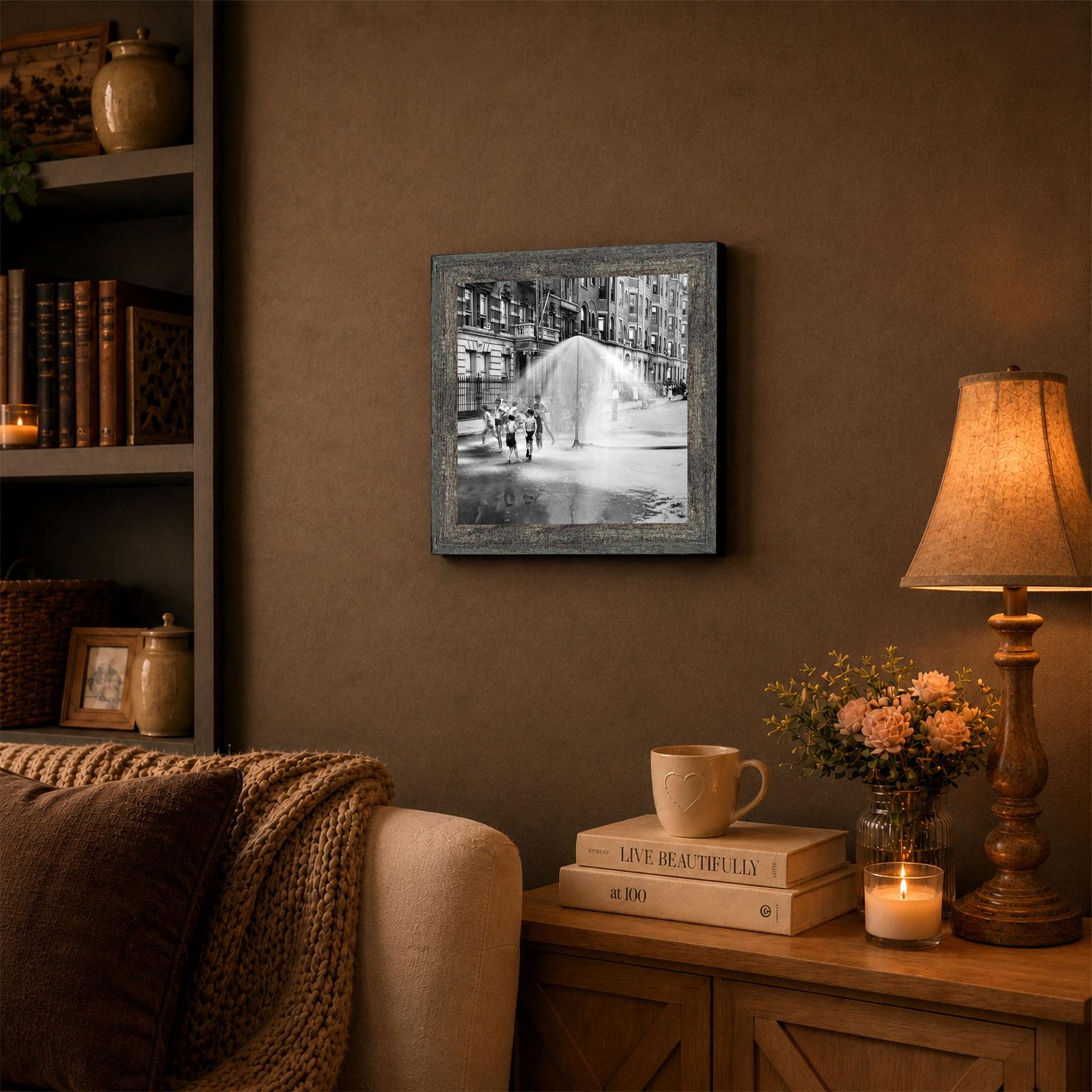 Vintage children playing framed wall art displayed in a den or living room