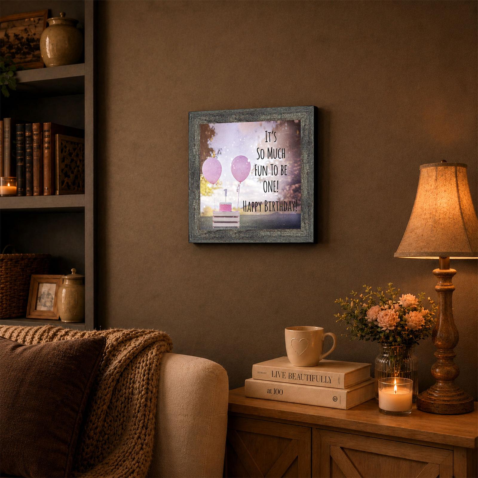 First birthday girl framed wall art displayed in a nursery