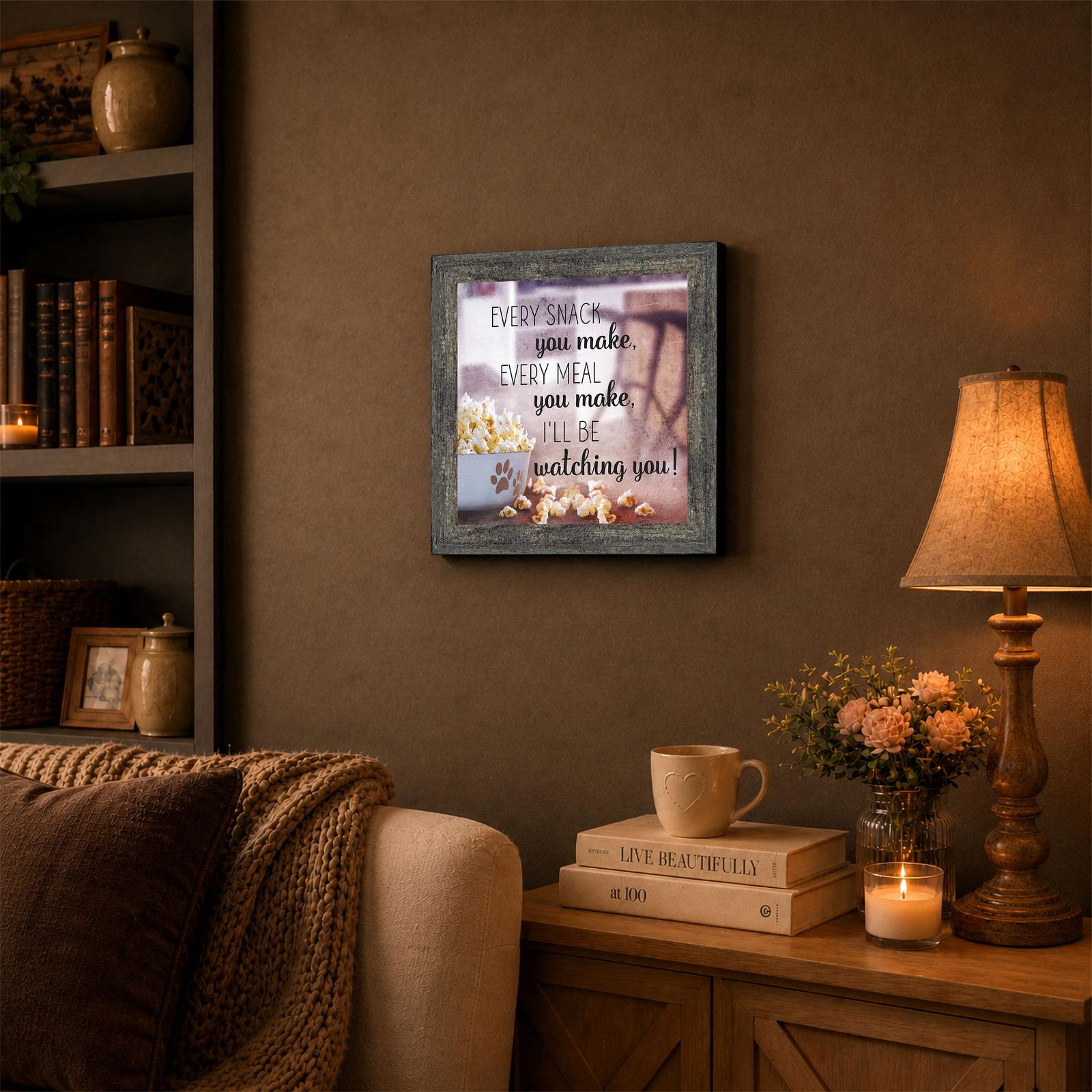 Every Snack You Make Framed Wall Art Displayed on a Kitchen Counter