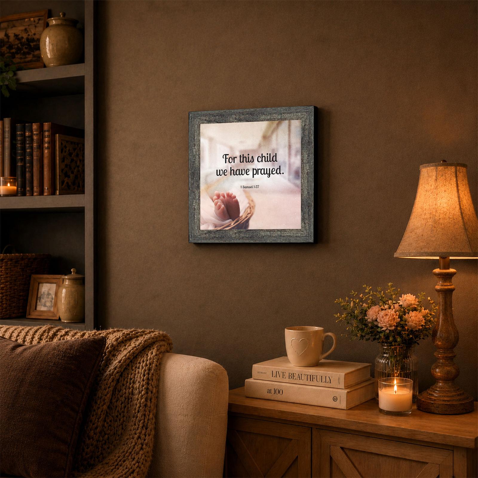 For This Child We Have Prayed framed wall art displayed in a hallway