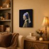 Girl with a Pearl Earring canvas wall art displayed in a bedroom
